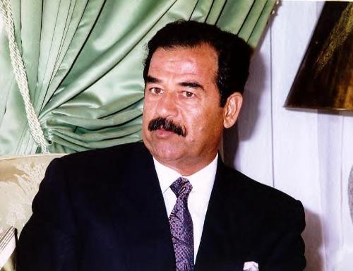 saddam hussain - Iraqi president Saddam Hussain in black suit.