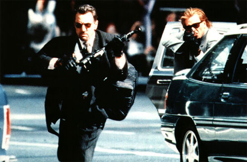 Heat - Hunters and their prey--Neil and his professional criminal crew hunt to score big money targets (banks, vaults, armored cars) and are, in turn, hunted by Lt. Vincent Hanna and his team of cops in the Robbery/Homicide police division. A botched job puts Hanna onto their trail while they regroup and try to put together one last big 'retirement' score. Neil and Vincent are similar in many ways, including their troubled personal lives. At a crucial moment in his life, Neil disobeys the dictum taught to him long ago by his criminal mentor--'Never have anything in your life that you can't walk out on in thirty seconds flat, if you spot the heat coming around the corner'--as he falls in love. Thus the stage is set for the suspenseful ending..  From: IMDB
