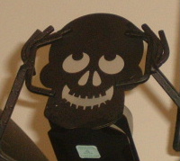 Skelton holding his head - He is just had it up to hear his kids are giving him a head ache.