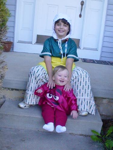 My children on Halloween - This is a picture of my two children.  My daughter is Laura Ingalls and my small son is a red M&M