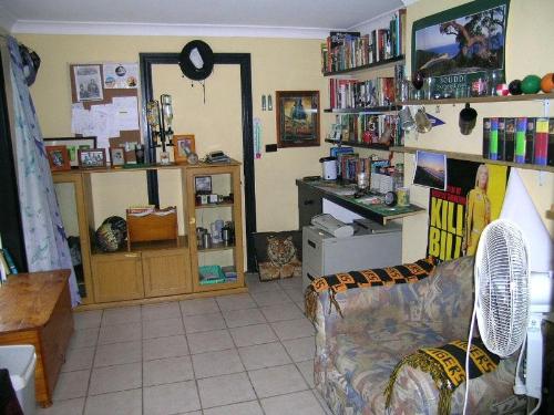 My office - This is my office at home, it has all my favourite stuff in it, and is where I go to read a book and just chill out. It has my library in it as well as my bar fridge for refreshments and a comfy chair.