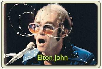 elton john - in the concert...whit hes eyeglasses...big!!eyeglasses