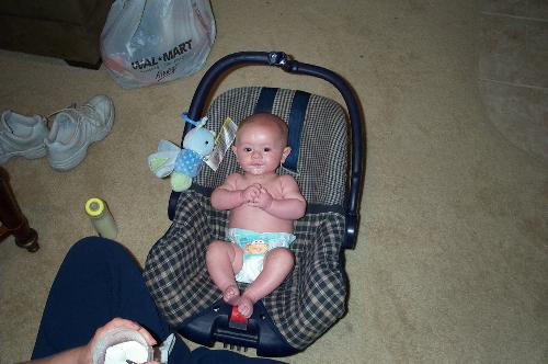 Trying food for the first time - My son was 4 months in this picture and he had just had his first few bites of cereal - and he LOVED it!