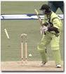 cricket  - A batseman playing a shot and being bowled out.cricket being a rivelry in india and pakistan.