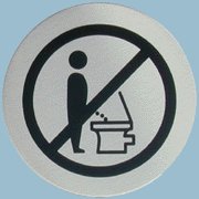 Do not stand! - Should signs like this tell men to sit down before they urinate?
