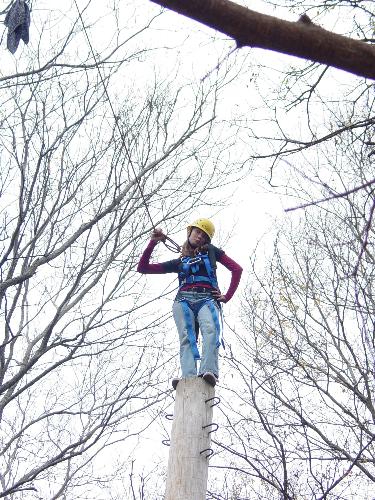 Strike a pose - It takes a pretty brave girl to strike a pose while on top of a 40 foot pole with only enough width to have one's feet side by side together! I am so proud of her!