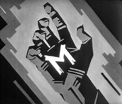 Finger M for Murder - A hand with a chalked 'M'