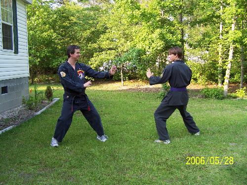 my husband and stepson - at the front yard of our home