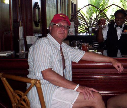 Dad in jamaca - Dad being cool in the heat by taking shelter at the bar!