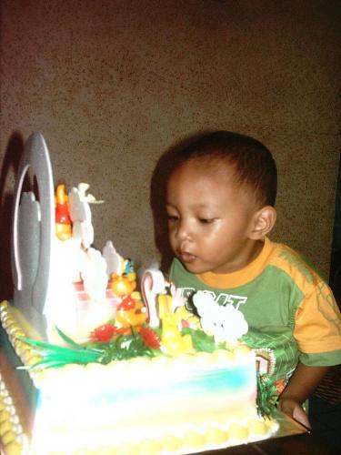 Happy Birthday, Utsa - Utsa celebrates his second birthday, with mom, dad, uncle and auntie.