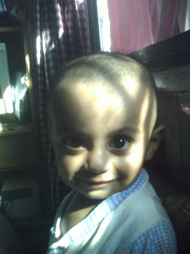 style icon of the year - he is one kid I know is always ready to pose for a pic... even when he is not evn one yr old...