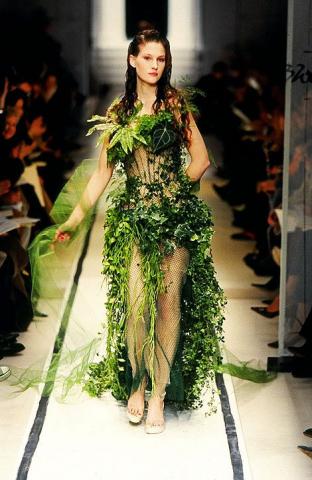 green woman - woman in green dressing looking like greenery woman or tree girl