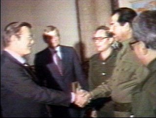 Donald Rumsfeld meeting Saddam - Shaking Hands: Iraqi President Saddam Hussein greets Donald Rumsfeld, then special envoy of President Ronald Reagan, in Baghdad on December 20, 1983.  Rumsfeld visited again on 24 March 1984; the same day the UN released a report that Iraq had used mustard gas and tabun nerve agent against Iranian troops.  This photo is credited to the National Security Archive (USA)