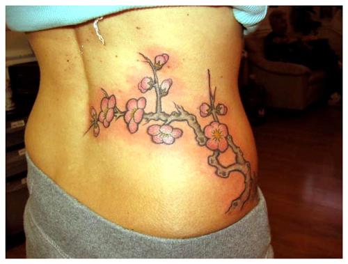 Cherry Blossom Tattoo - Custom Art - This is tattoo is totally a one of a kind piece.  I think it's sexy!