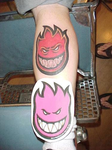 Grin Tattoo - Not custom, but customized.