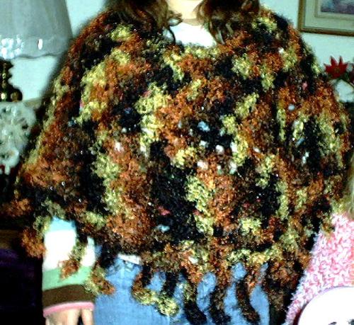 Crocheted poncho - Poncho crocheted in eyelash and black