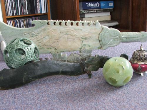 Some of My Jade Collection - 2 swords, on white jade and one green jade. 2 puzzle balls of different green jades. 1 of my red jade censers or incense containers