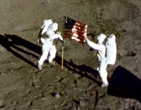 Neil Armstrong and  Aldrin deploy a U.S. flag on t -  Pictures of Apollo astronauts erecting a US flag on the Moon show the flag bending and rippling. How can that be? After all, there's no breeze on the Moon....  see captionsNot every waving flag needs a breeze -- at least not in space. When astronauts were planting the flagpole they rotated it back and forth to better penetrate the lunar soil (anyone who's set a blunt tent-post will know how this works). So of course the flag waved! Unfurling a piece of rolled-up cloth with stored angular momentum will naturally result in waves and ripples -- no breeze required!