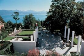 Lausanne, Lake Geneva Region -  Lausanne, better known as the Olympic Capital, is in the French speaking part of Switzerland. Facing the Evian les Bains, which is a source of the world famous Evian Mineral Water brand, this Roman city is flanked on either side by Geneva and Montreaux. A wine producing region, the vineyards in the surrounding hills provide spectacular views of the Jura hills in the north and challenging routes for mountain sports like cycling. Must Sees and Must Dos Olympic Museum - if sports are an integral part of your life, this is the museum for you. Located in Lausanne, the Olympic Museum houses three form of human expression - sport, art and culture - in one site. Accordingly, Olympism is a state of mind and the Olympic Museum is its symbol. The museum hosts various exhibitions related to sports as is also a very good library for reference. The Museum displays memorabilia of the past Olympic Games and Olympic coins struck by the mints of host countries of the Olympic Games. The Olympic Museum, 1, Quai d'Ouchy, 1001 Lausanne Tel. (+41 21) 621 65 11. Fax (+41 21) 621 65 12  Ouchy - If Lausanne is relaxed, then, Ouchy it's lakeside terrace, is ideal to stroll, chill out, and enjoy the mountain views and fresh breezes. On Lake Leman, it is a separate commune from Lausanne, and has survived for years as a fishing port, but these days, it's become one of the more chic of the Swiss lakeside resorts, with waterfront cafés abounding. The castle of Ouchy is an old medieval castle now running as a hotel. It is also very popular with the tourists for its spectacular view of Evian-les-Bains. Surroundings Gstaad - is a small village in the German-speaking part of west Switzerland. A ski resort for the wealthy and the elite, Grace Kelly and her husband Rainier III, Prince of Monaco owned a luxurious chalet in Gstaad. It also houses other rich and famous names, like Roger Moore, Tina Turner, Günter Netzer, Paris Hilton, Sean Lynch-Staunton, Roger Federer, Dame Elizabeth Taylor and Kofi Annan. Along the car free Promenade that has been thus created are countless exclusive shops, restaurants and hotels and the charming houses, which are all built in the chalet style. A must visit here is the Glacier 3000 summit for a breathtaking view and adventure sports.