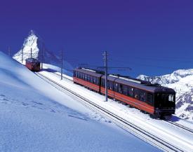 Gornergrat - Zermatt, Zermatt, Valais -  At the Gornergrat, discover a natural alpine paradise, amid aromatic stone pine and larch forests. Across vastalpine meadows in summer full of flowers, and in winter covered with deeply snow-capped glaciers, lies the famous Gornergrat. Giving all a perfect view of the highest point in Switzerland, The Dufour-Spitze, this idyllic mountain village is one of the biggest resorts in Switzerland. How to get there - The Gornergrat Bahn takes you from Zermatt up the 3089 m high Gornergrat. It (GGB) is a 6 km long meter gauge mountain rack railway, with abt rack system, out of Zermatt, Switzerland, (Canton Valais). Experiences The Gorner Gorge - Those still seeking adventure might like to take a trip to this gorge. Here you'll not only find roaring water masses thundering into the depths through the narrow rock formations, but also a type of adventure fixed rope climbing route with dizzying heights that need to be abseiled down. Please register at the Alpin Center!  Sunrise - An experience of a lifetime. Watch dawn break in on the Matterhorn horizon from the Gornergrat. The silhouette of the majestic Matterhorn rises steeply in the early morning sky. Depart from Täsch railway station 20 minutes earlier than from Zermatt. Tickets are available from the Matterhorn Gotthard Bahn ticket office.  Accomodation 3100 Kulmhotel Gornergrat - The Absolute Summit Experience. Welcome to the highest hotel in the Swiss Alps! The Kulmhotel Gornergrat has stood on Gornergrat, Zermatt's most popular destination for excursionists, for almost a century. The hotel's unique location, the breathtaking panorama in the midst of 29 peaks and the pure mountain air, combined with the traditional hospitality of the Valais, have made Kulmhotel a popular venue for climbers, skiers, sun-worshippers and astronomers alike.  Igloo Village - is a unique experience, offered by multi-bed igloos for families, companies, clubs, and tour groups as well as for single travellers. Enjoy the special igloo atmosphere together and share this unforgettable experience.In Gornergrat, around 40 minutes from Zermatt is the famous Igloo Village. The rack railway the first electric railway of its kind in Switzerland - winds its way up the mountain arriveing into Rotenboden station, a mere stone's throw from the Igloo village and the toboggan run. Rotenboden is situated on the ski piste from Gornergrat to Riffelberg. Igloo Bar Zermatt is located right next to our Igloo Village at Rotenboden. This snow temple, ornamented with artistic sculptures, offers unforgettable pit stops with hot beverages by cold walls as original Swiss cheese foundue.