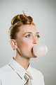 blowing bubble gum - chewing gum when aire is left will become buuble gum