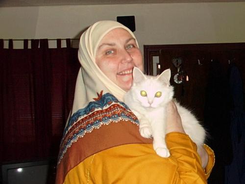 Sister Basimah & Friend - lady and cat