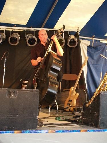 me and my baby - This is me with my standup bass. i play in a rockabilly band. This is me filling in with a delta blues act.