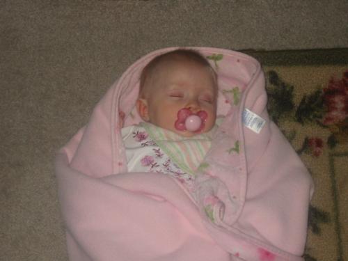 My baby girl - She is 6 months old and she fell asleep we thought she looks so cute