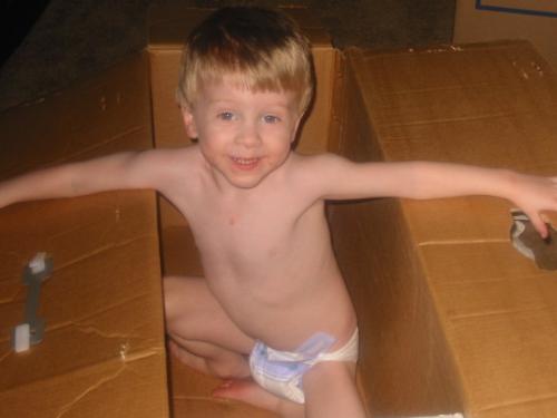 My son in a box - My son loves to hang out in boxes