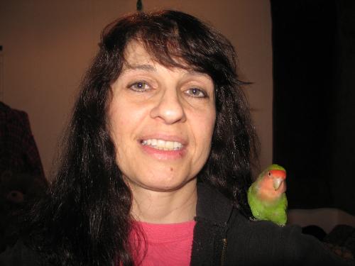 Pekachu and Sammie - This is me and 1 of my birds she is a lovebird just about a year old