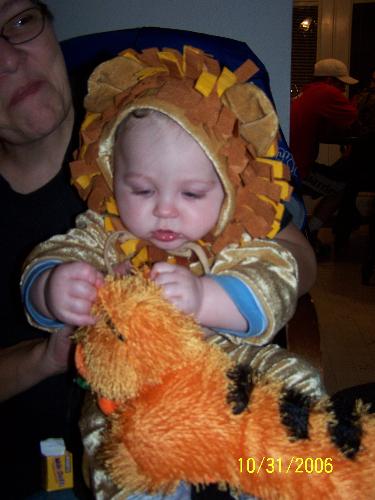 Halloween - Sheridan playing with Cambrie's toy