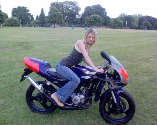 my rs50 with girl - my first ever motorbike. Rs50 de-restricted, was pretty good i think, great handling and i could do a whopping 68mph! this is pretty good for a 50cc in my mind. i took it over a local park when i got it and got talking to a few of my friends, this girl decided she wanted to sit on it so of course i pulled out my camera and decided it was time for a few pics!