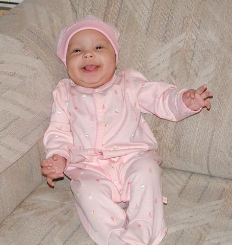 My babygirl. - Isn't she the happiest baby ever.