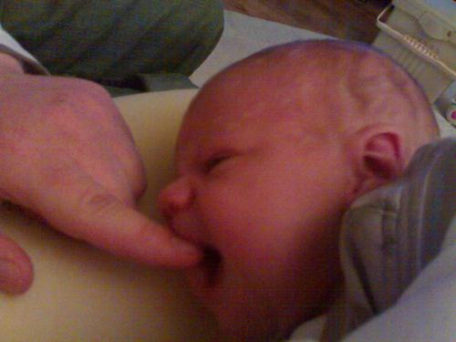 My Babba! - This is my little boy trying to eat his daddy's finger lol