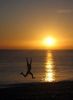 Jump for joy - Jump for joy at beach scene Jump for joy - Jump for joy at beach scene