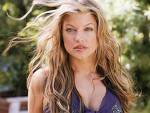 Fergie - Member of the Black Eyed Peas. Real name:  Stacy Ann Ferguson