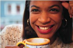 Lady with the cup of coffee - This pregnant lady is having coffee