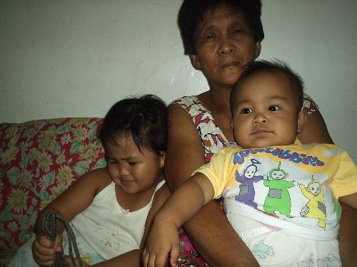 nanay, akei & kal-el - my mother-in-law and her garndchildren keisha and kal-el. Nanay is the epitome of a loving mother and a doting grand mother.  She guides and takes care of her children and grandchildren like a lioness.