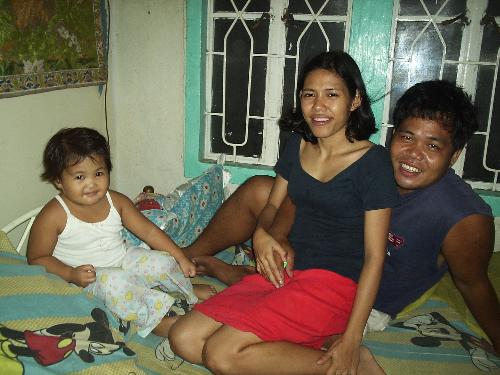 family - Our niece Keisha, my hubby win and me.  During one of those playful times.  I love this adorable baby like my own though she is biologically my husband's niece.  She reminds me of what could have beens if my own angel, Stephanie was alive.