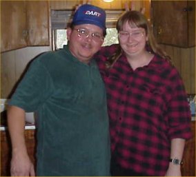 Me and my hubby - This is me and my hubby.  We have been married over 11 years so far and counting.  The pic itself is a few years old, before I started chemo, but my hair is growing back now.