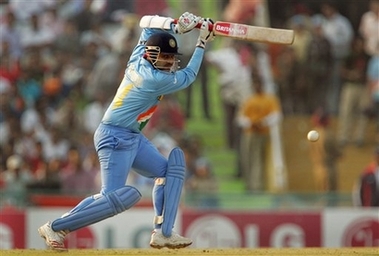 Virender Sehwag plays a shot - Virender Sehwag plays a shot against Australia during the one day international cricket match for the ICC Champions Trophy in Mohali, India, Sunday, Oct. 29, 2006