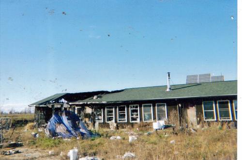 Our house which needs repair - This was taken a bit ago and the yard is in better shape however we still need to get about 450 sq ft or so of roofing and some framing with 2x6's and drywall. Then  few new windows and we should be able to easily reclaim living their and thus our lives