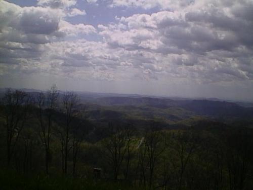 North Carolina morning. - This is a picture taken in North Carolina on a beautiful morning the sky is beautiful blue and the clouds look like skiffs of cotton candy. and the hills and trees are just magnificent. I love this picture.