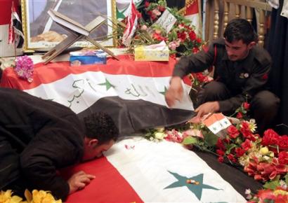 Saddam - Saddam's coffing in Baghdad. The end of the road for the world aclaimed dictator