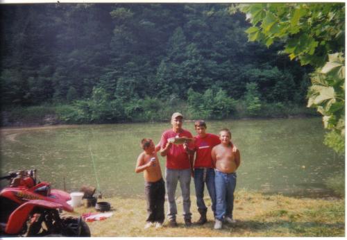 My Family - My husband Joe, Christian, Daniel And our nephew Trey This picture was taken last summer on a camping trip we all took while my husband was on vacation.