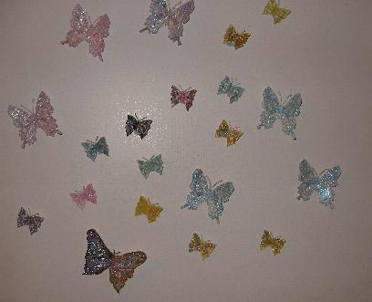 My Butterflies - My butterflies made with a rubber stamp then sprinkled with very fine glitter, I uese these to attach to cards until then thry decorate my room...