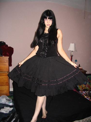 November 4th 2006 - The skirt i just got in the mail from ebay and the corset-esque shirt is from a store called Dots... yay for clearance!