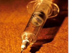 Drug Abuse - A bare Syringe of Drugs....