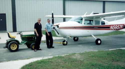 Ben and Doug - Taken in Elizabeth City, NC at regional airport in July 2000.  My brother doug and my self. We had just moved the 210 Cessna out of hangar for short sight seeing around Outerbanks of NC.