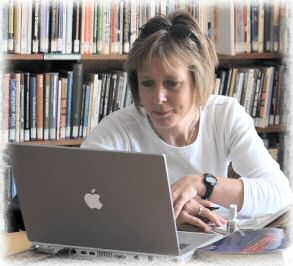 computing - a woman on her computer